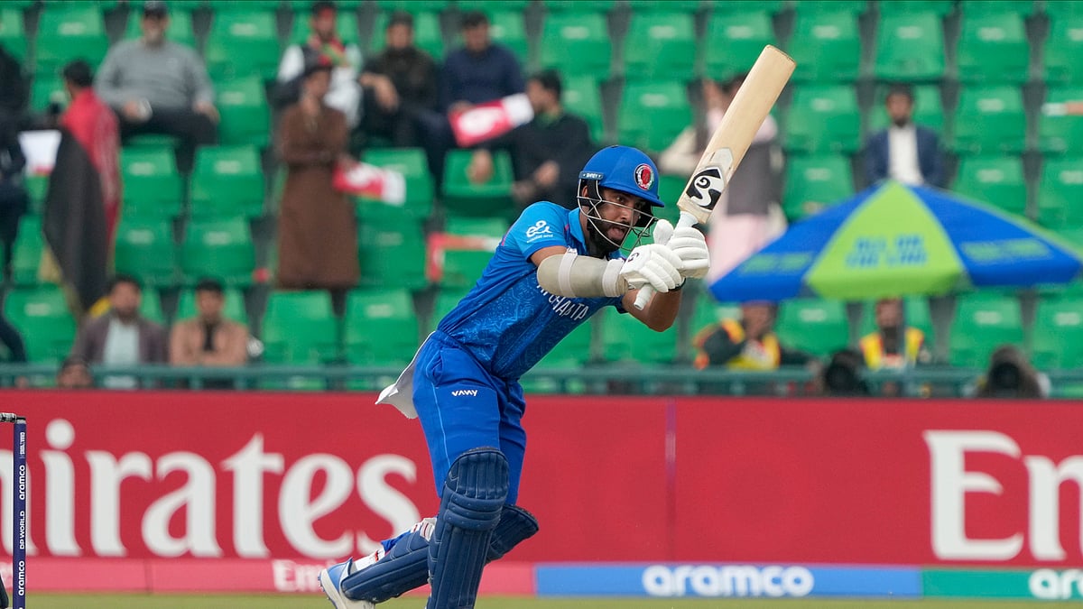 AP Photo/K.M. Chaudary : Afghanistan's Hashmatullah Shahidi bats during the ICC Champions Trophy cricket match between Afghanistan and England, in Lahore.