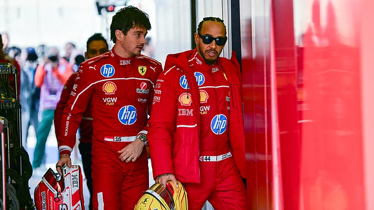 Lewis Hamilton pictured with Charles Leclerc at pre-season testing. - null