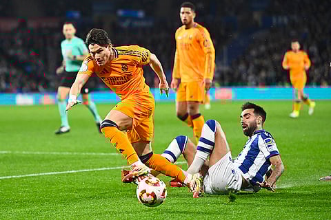 Copa del Rey, RSO vs RMA: Real Sociedad's Brais Mendez challenges for the ball with Real Madrid's Fran Garcia