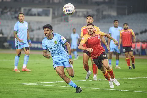 ISL2024-25, EBFC vs HFC: Nishu Kumar of East Bengal and Abdul Rabeeh AK of HFC vie for the ball