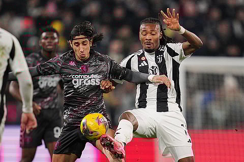 Coppa Italia Quarter-final: Empoli's Youssef Maleh battles for the ball with Juventus' Khephren Thuram