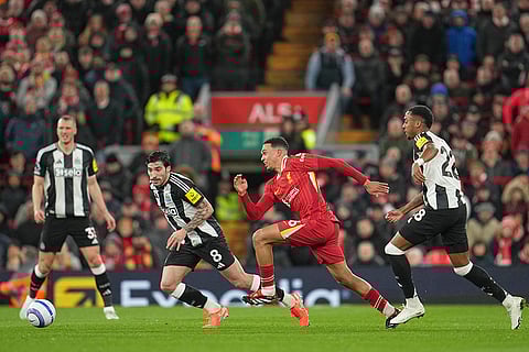 EPL 2024-25: Liverpool's Trent Alexander-Arnold chases the ball with Newcastle's Sandro Tonali