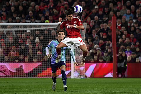 EPL 2024-25: Nottingham Forest's Nicolas Dominguez jumps for the ball