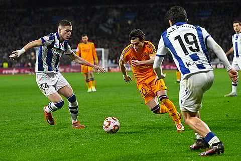 Copa del Rey, RSO vs RMA: Real Madrid's Fran Garcia challenges for the ball with Real Sociedad's Luka Sucic, left