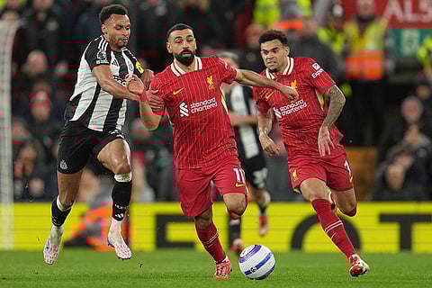 EPL 2024-25: Newcastle's Jacob Murphy challenges Liverpool's Mohamed Salah