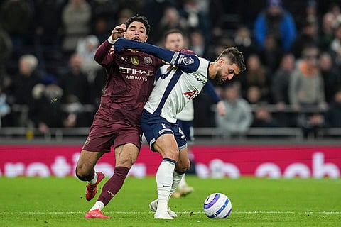 EPL 2024-25: Manchester City's Omar Marmoush challenges for the ball with Tottenham's Rodrigo Bentancur