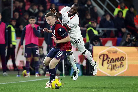 Serie A 2024-25: Bologna's Lewis Ferguson and Milan's Yunus Musah in action