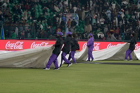 ICC Champions Trophy, AFG vs AUS: Groundsmen cover the pitch and other area