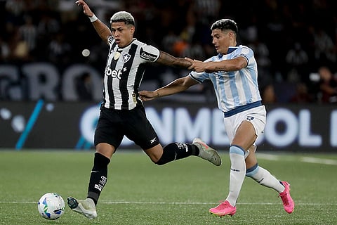 Recopa Sudamericana 2025 Final: Matheus Martins of Botafogo and Maximiliano Salas of Racing Club battle for the ball