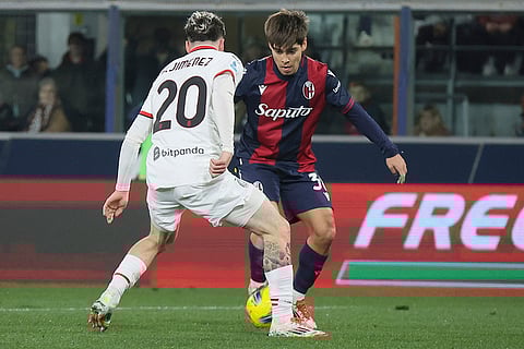 Serie A 2024-25: Bologna's Benjamin Dominguez and Milan's Alex Jimenez in action