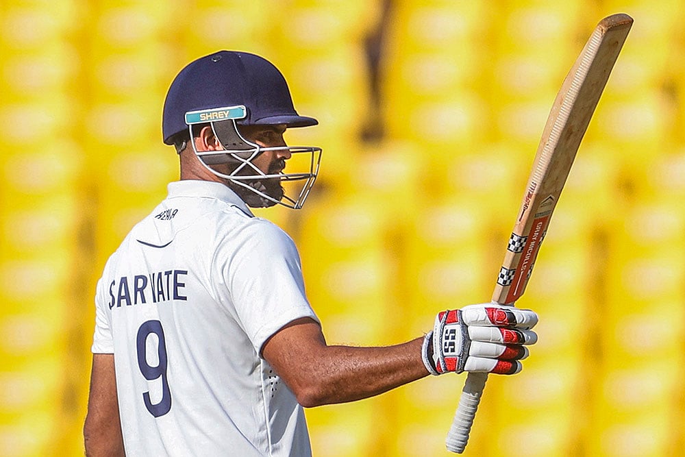 | Photo: PTI : Ranji Trophy Final, VIDAR vs KER-Day 2: Kerala’s Aditya Sarwate celebrates his half century