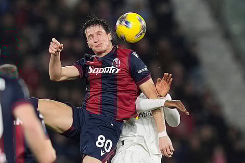 Serie A 2024-25: Bologna's Lorenzo De Silvestri and AC Milan's Youssouf Fofana in action