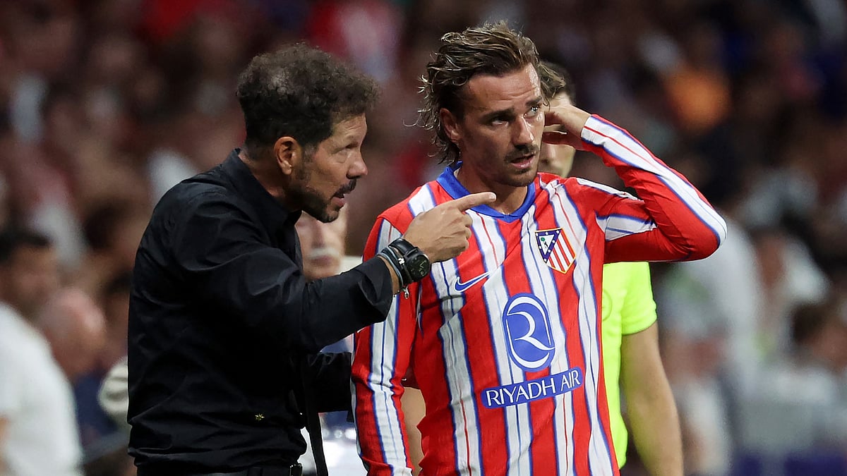 Antoine Griezmann and Diego Simeone