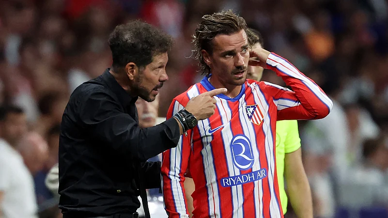 Antoine Griezmann and Diego Simeone