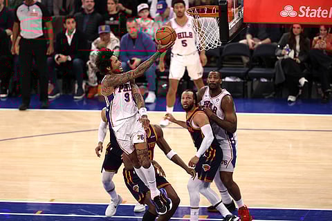 NBA 2024-25: 76ers' Kelly Oubre Jr. attempts to shoot the ball