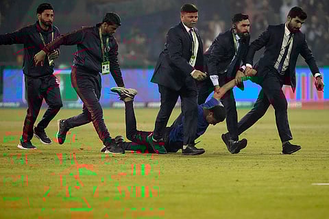 CT 2025, AFG vs ENG: Security officers carry a pitch invader