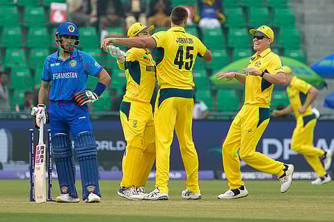 ICC Champions Trophy, AFG vs AUS: Australia's Spencer Johnson, center, celebrates a wicket