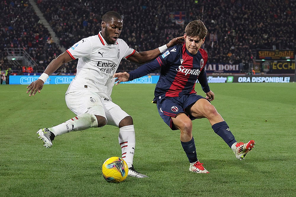 | Photo: Michele Nucci/LaPresse via AP : Serie A 2024-25: Milan's Yunus Musah and Bologna's Benjamin Dominguez in action