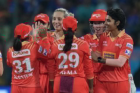 WPL 2025, RCB vs GG: Gujarat Giants’ captain Ashleigh Gardner celebrates after taking the wicket of Bengaluru’s Ellyse Perry