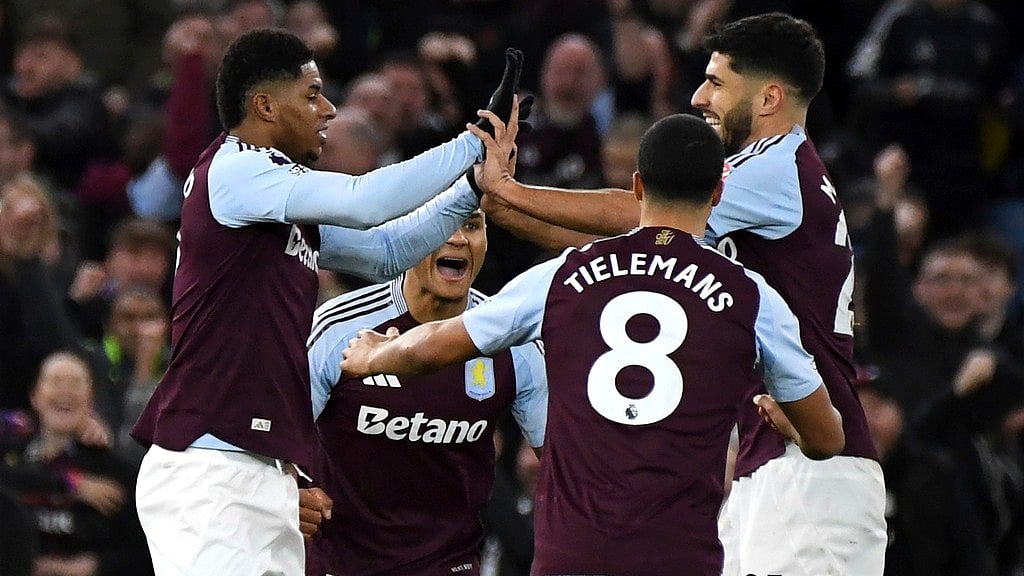 AP : Aston Villa's Marco Asensio, right, celebrates with his teammates after scoring a goal against Chelsea in the English Premier League.