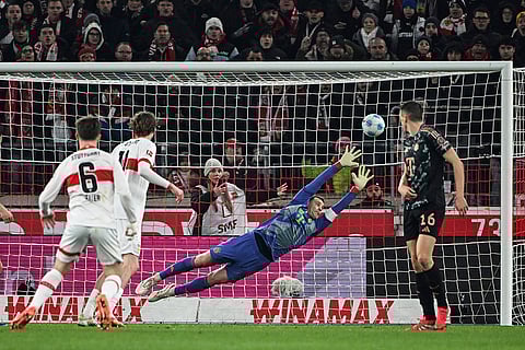 Bundesliga soccer 2024-25: Stuttgart's Angelo Stiller, left, scores a goal