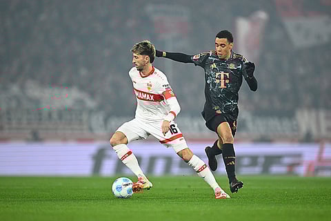 Bundesliga soccer 2024-25: Stuttgart's Atakan Karazor and Munich's Jamal Musiala fight for the ball