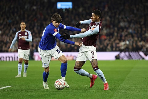 English FA Cup fifth round: Aston Villa's Marcus Rashford and Cardiff City's Perry Ng challenges for the ball