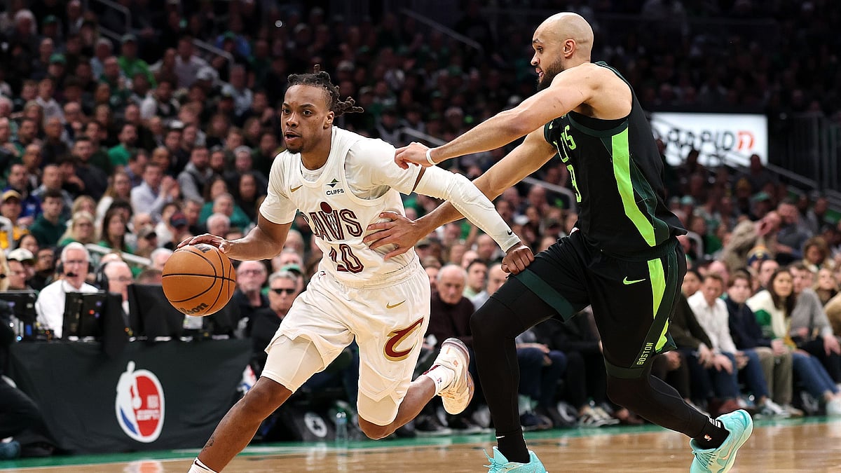 Darius Garland #10 of the Cleveland Cavaliers drives towards the basket past Derrick White #9 of the Boston Celtics during the second half at TD Garden on February 28, 2025 in Boston, Massachusetts. The Cavaliers defeat the Celtics 123-116.