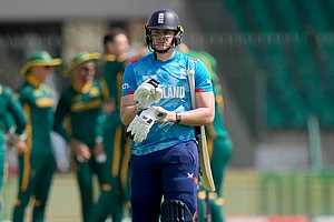 | Photo: AP/Anjum Naveed. : Champions Trophy 2025, RSA Vs ENG: England's Jamie Smith walks off the field after his dismissal