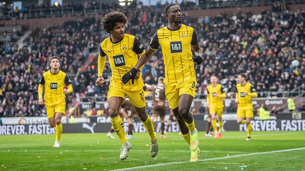 Serhou Guirassy and Karim Adeyemi celebrate Dortmund's opening goal