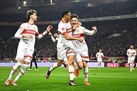Bundesliga soccer 2024-25: Stuttgart's Angelo Stiller, right, celebrates scoring a goal