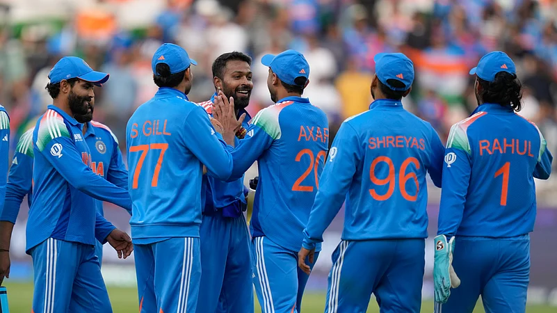 Indias Hardik Pandya, centre, celebrate the wicket. AP Photo