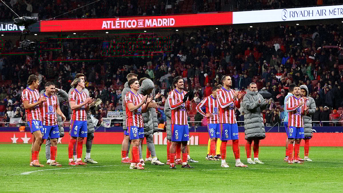 Atletico Madrid's players celebrate their win over Athletic Bilbao