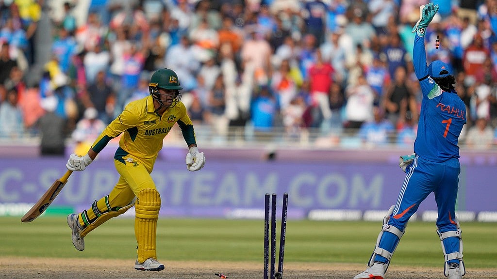 AP : Australia's Alex Carey, left, is run-out by India's Shreyas Iyer during the ICC Champions Trophy semi-final.