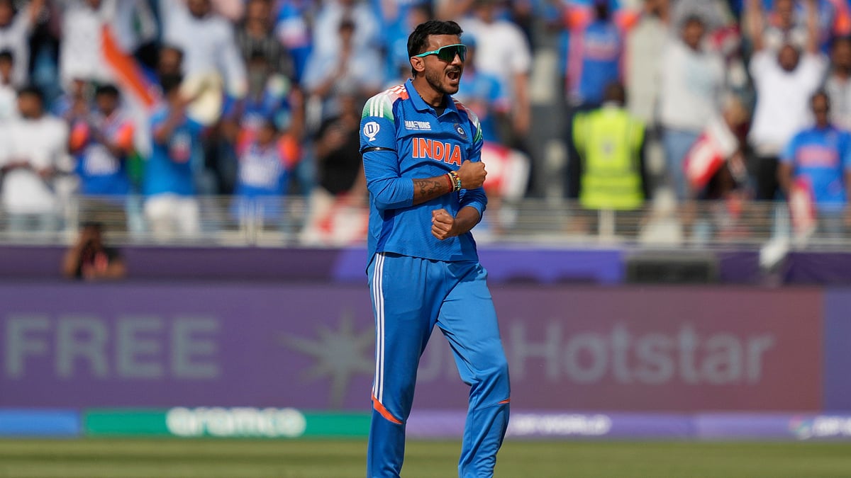 AP Photo/Altaf Qadri : India's Axar Patel celebrates the dismissal of Australia's Glenn Maxwell during the ICC Champions Trophy semifinal cricket match between India and Australia at Dubai International Cricket Stadium in Dubai, United Arab Emirates.
