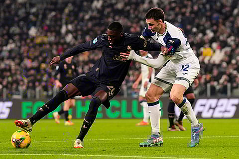 Serie A 2024-25: Juventus' Kolo Muani Randal and Verona's Diego Coppola challenge for the ball