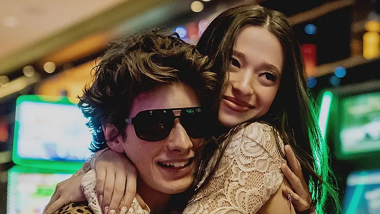 A still of Mikey Madison and Mark Eydelshteyn from Anora - X