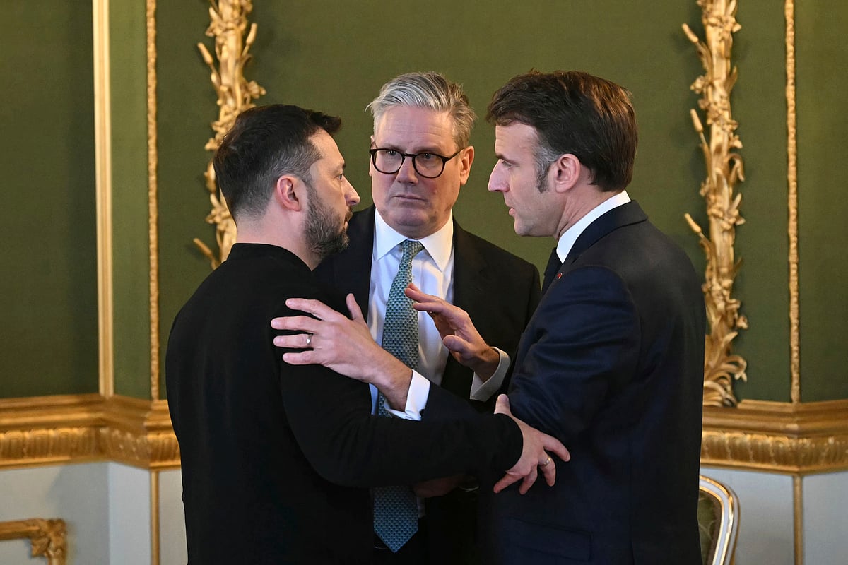 AP : Britain's Prime Minister Keir Starmer, center, Ukraine's President Volodymyr Zelenskyy, left, and France's President Emmanuel Macron meet during the European leaders' summit to discuss Ukraine at Lancaster House, London, Sunday March 2, 2025 |