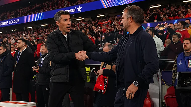 Bruno Lage and Hansi Flick share a handshake. - null