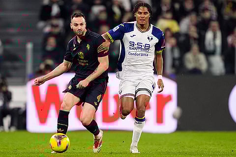 Serie A 2024-25: Juventus' Federico Gatti and Verona's Ami Sarr challenge for the ball