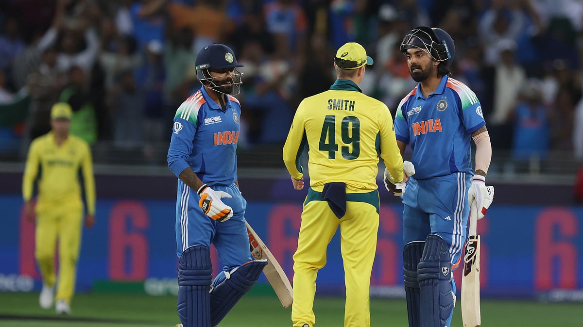 AP Photo/Christopher Pike : Australia's captain Steve Smith congratulates India's KL Rahul and India's Ravindra Jadeja after Indian won during the ICC Champions Trophy semifinal cricket match between India and Australia at Dubai International Cricket Stadium in Dubai.