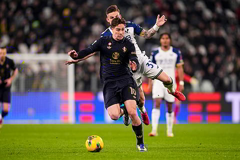 Serie A 2024-25: Juventus' Kenan Yildiz and Verona's Ondrej Duda challenge for the ball