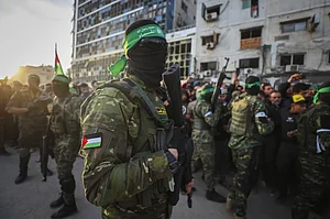 AP : Hamas members in war-ravaged Gaza Strip