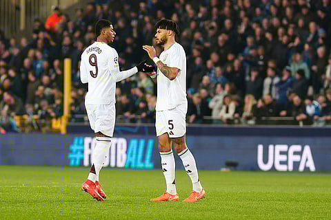 UCL 2024-25 Round Of 16 First leg, Brugge vs Villa: Marcus Rashford, left, and Tyrone Mings at the start of the game