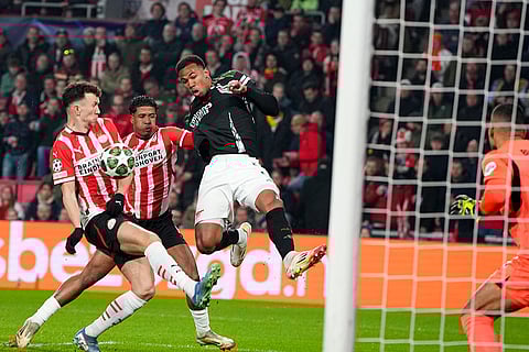 UCL 2024-25 Round Of 16 First leg, PSV vs ARS: Gabriel challenges for the ball with Ismael Saibari