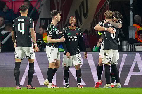 UCL 2024-25 Round Of 16 First leg, PSV vs ARS: Riccardo Calafiori celebrates after scoring his side's seventh goal