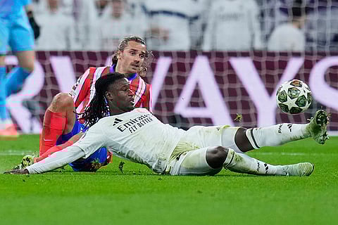 UCL 2024-25 Round Of 16 First leg, RMA vs ATM: Eduardo Camavinga, right, fights for the ball with Antoine Griezmann