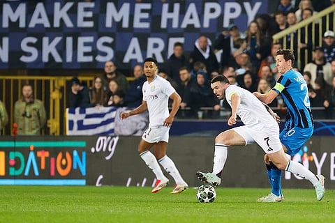 UCL 2024-25 Round Of 16 First leg, Brugge vs Villa: John McGinn, center, fights for the ball with Hans Vanaken