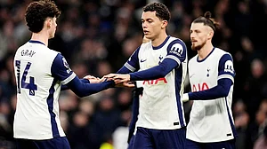| Photo: John Walton/PA via AP : Tottenham Hotspur's Brennan Johnson, center, celebrates after scoring his side's second goal