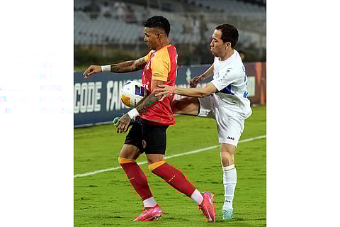 2024–25 AFC Challenge League, East Bengal vs Arkadag: East Bengal FC's Richard Enrique Sanchez and FC Arkadag's Gurbanov Yazgylych vie for the ball